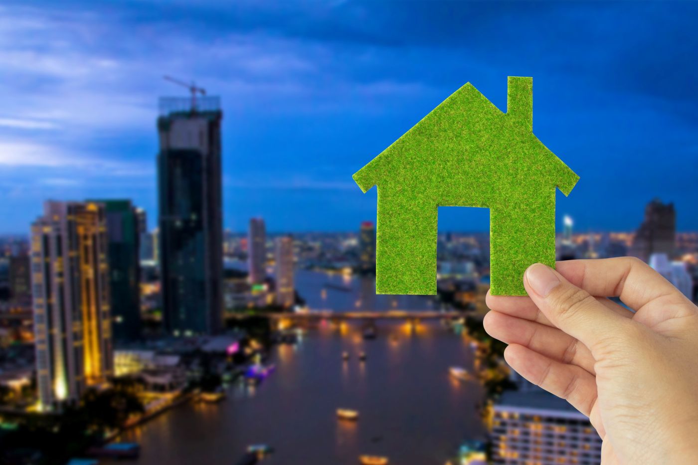 Sustainable real estate concept with green house